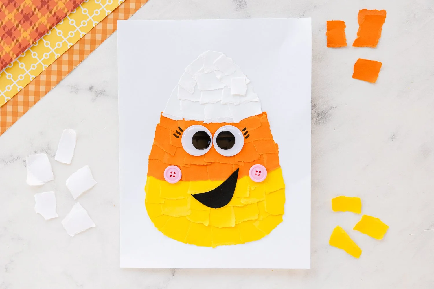 Colorful Candy Corn craft project materials and finished decorations