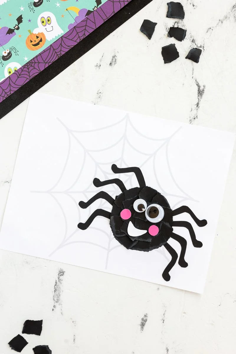 Colorful torn paper spider craft for kids