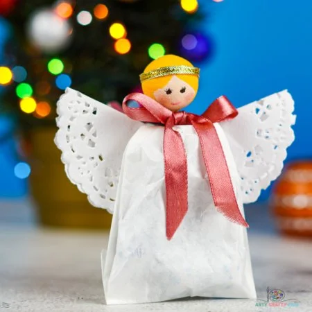 Angel Christmas gift bag from Arty Crafty Kids decorated with festive designs