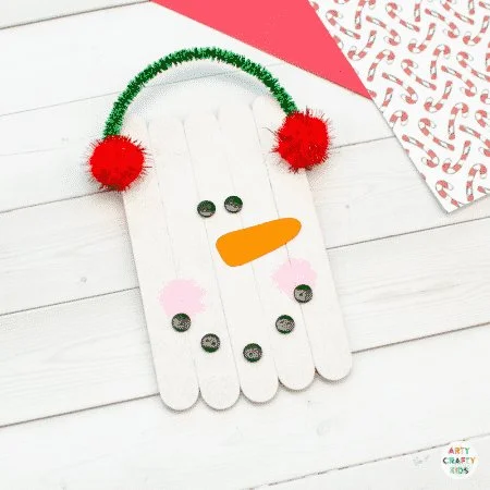 Craft stick snowman ornament for holiday decoration