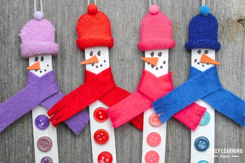 DIY snowman crafts for kids creating a Christmas ornament